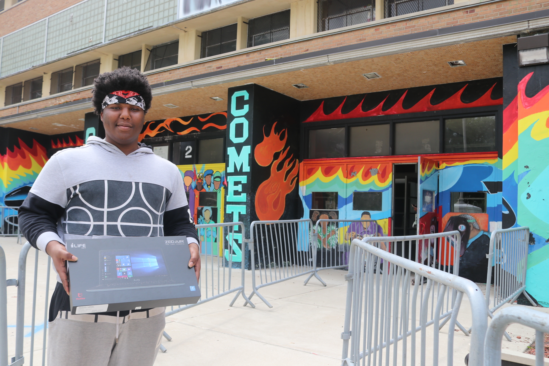 Student showing off his new Connected Futures Device 